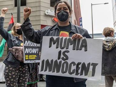 Mumia Abu-Jamal supporters gather outside hearing for new trial