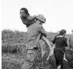 http://www.informationclearinghouse.info/vietnam-us-soldier-carries-woman.JPG