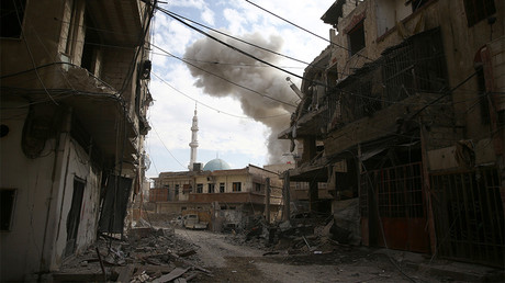 FILE PHOTO: Smoke rises from the rebel held besieged town of Hamouriyeh, eastern Ghouta, near Damascus, Syria  Bassam Khabieh
