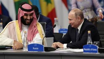 Saudi Arabia's Crown Prince Mohammed bin Salman (L) and Russia's President Vladimir Putin attend the G20 Leaders' Summit in Buenos Aires, Argentina, on November 30, 2018. (Photo by AFP)