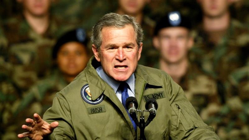 Then President George W Bush is seen addressing the US Army soldiers at Fort Hood, Texas about the possibility of military action against Iraq in January 2003 [File: Jeff Mitchell/Reuters]